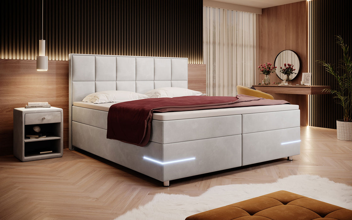 Lit boxspring Lea avec éclairages LED et pieds chromés (velours 7 coloris)