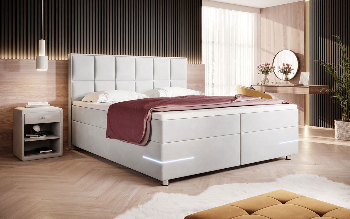 Lit boxspring Lea avec éclairages LED et pieds chromés (velours 7 coloris)